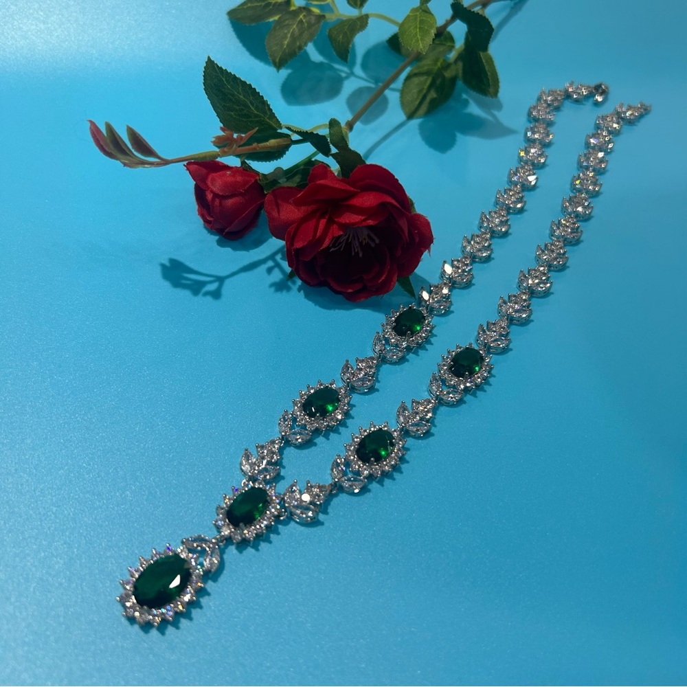 14k white gold plated simulated Emerald Necklace.18 inches long/prong setting.
